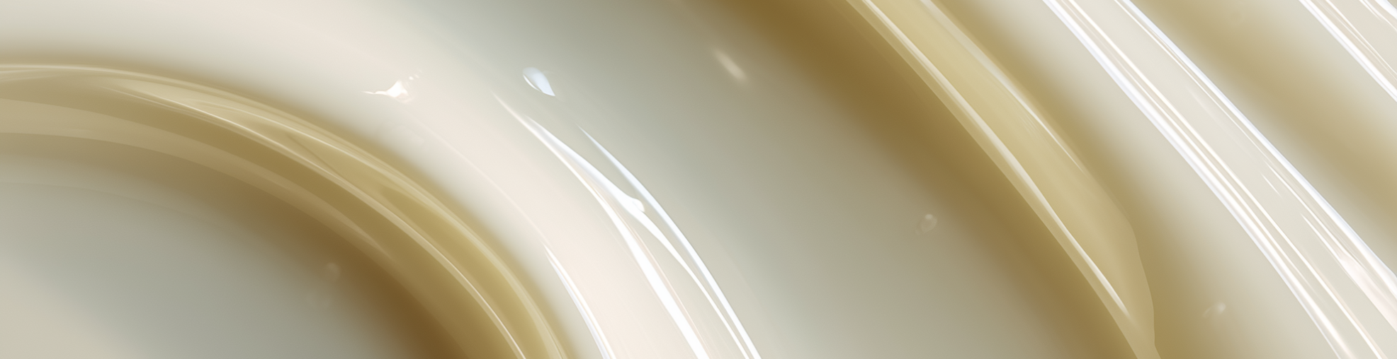 Close-up of a smooth, beige surface with a subtle gradient.